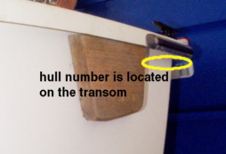 You can locate the hull number on the starboard side of the transom